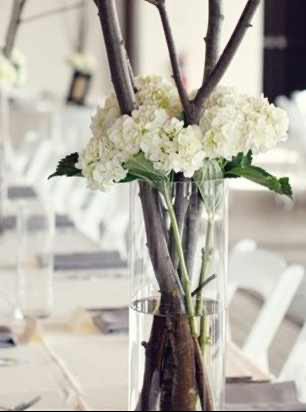 Glass Vase with Branches and Artificial Hydrangeas Filled with Water