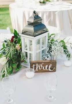 White & Silver Top Lantern with Foliage and Flowers